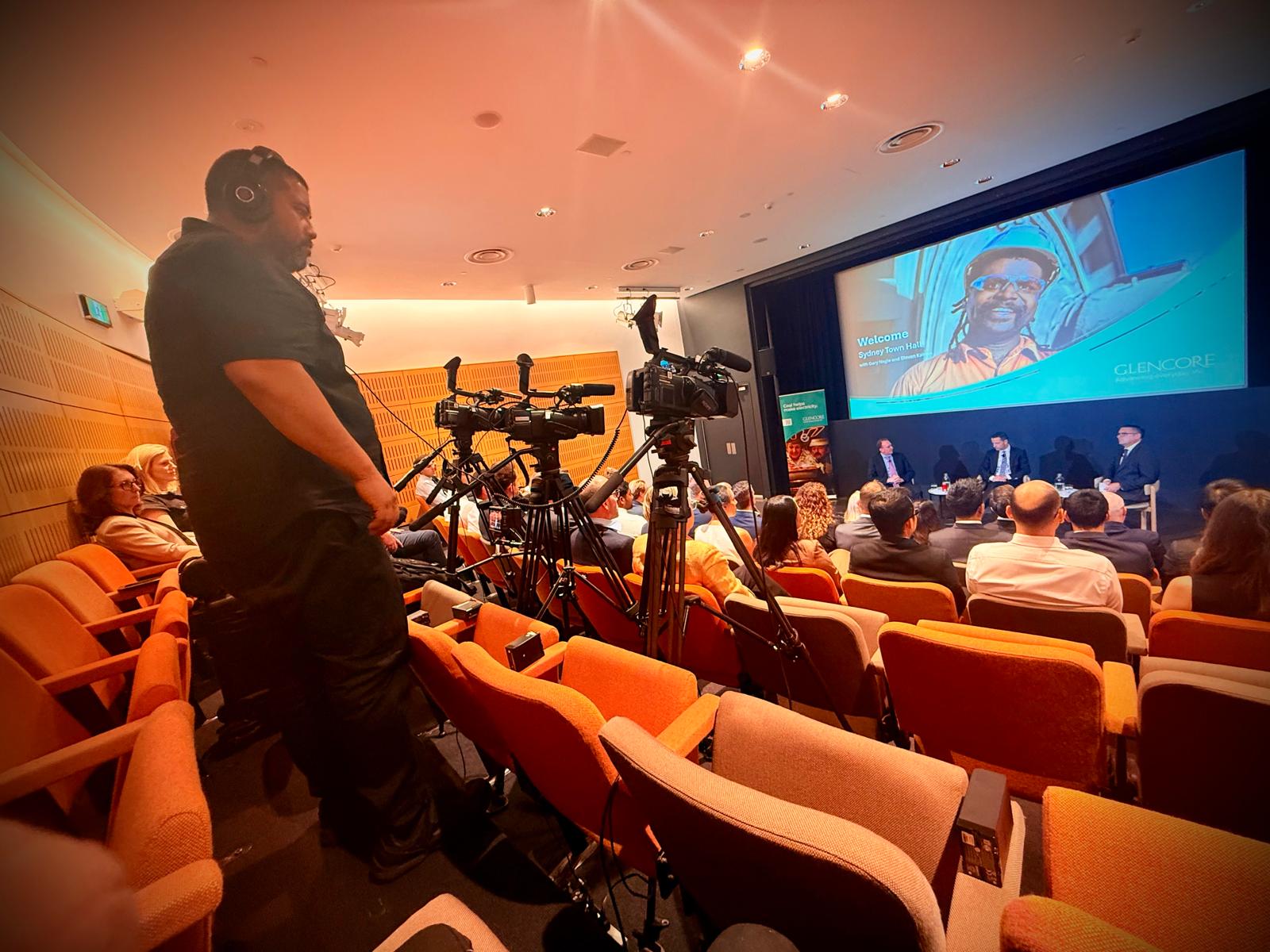 Camera operator at Glencore corporate event