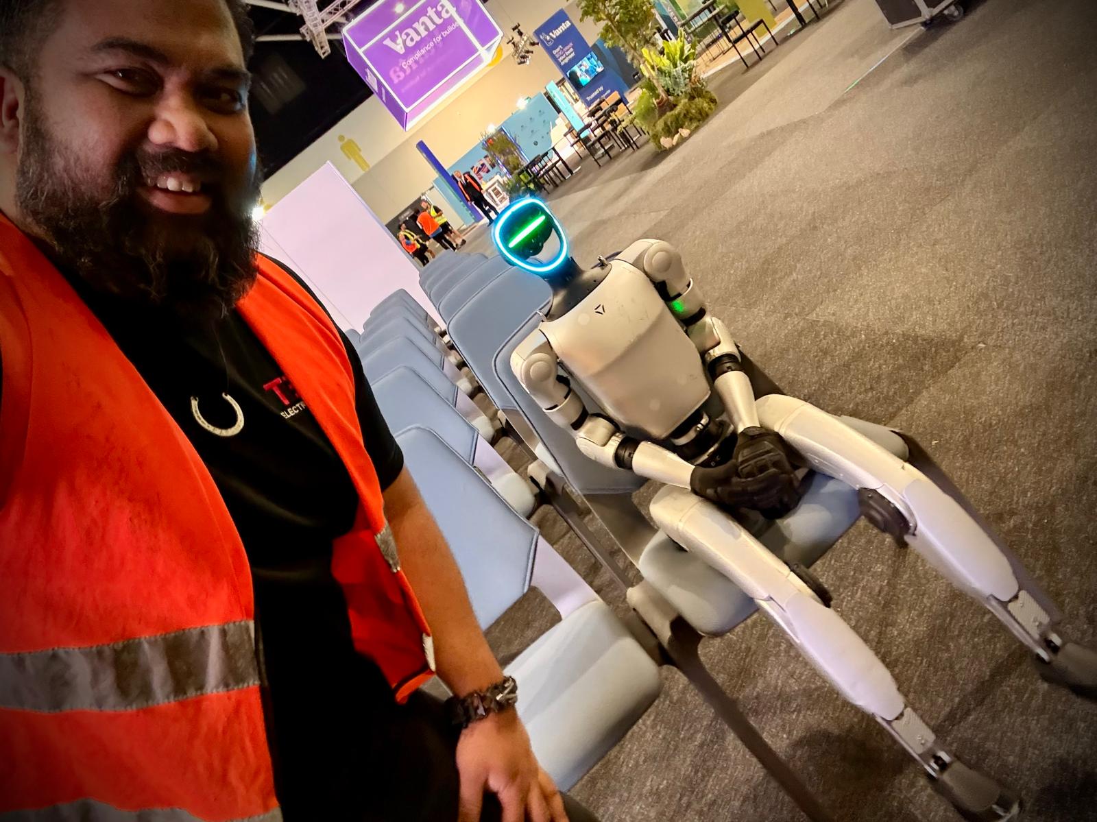 TEK crew with quadruped robot at tech expo